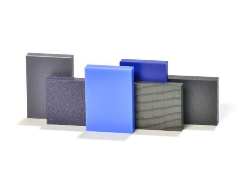 Engineering plastic sheet samples in different colors and surface finishes